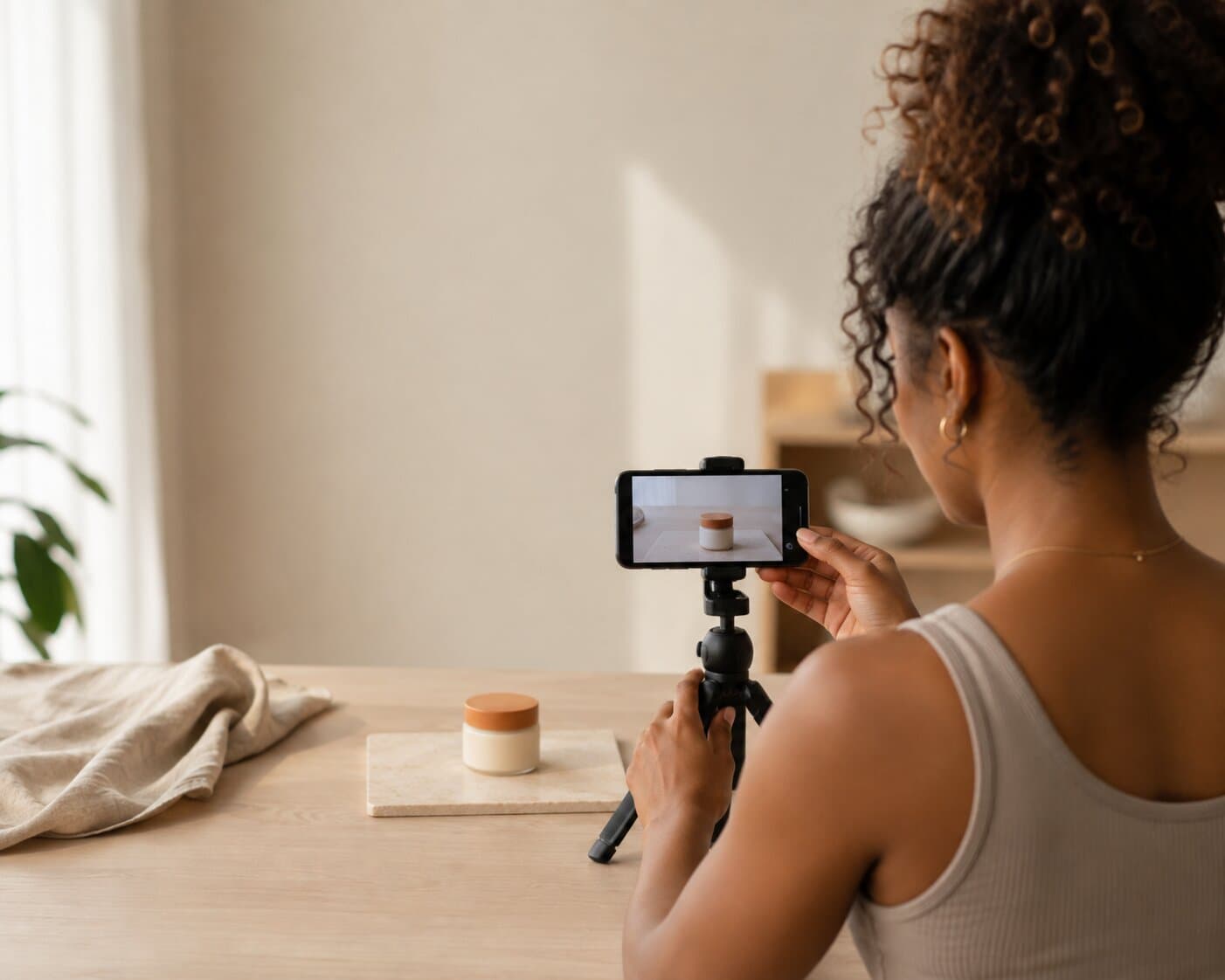 Creator filming a product on a tripod